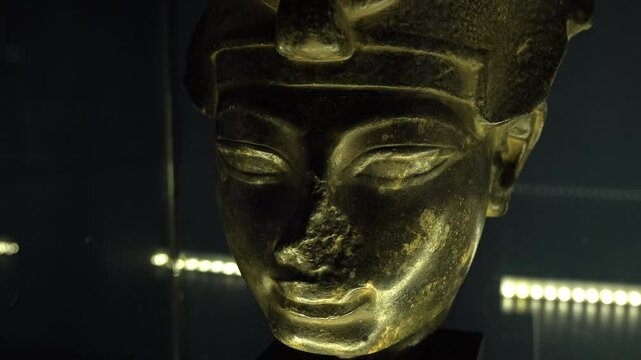Royal mask of ancient Egyptian pharaoh Akhenaten, Egypt exhibit in museum