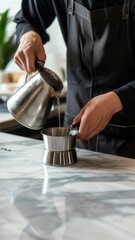 cropped shot of barista pouring water from coffee pot into cup