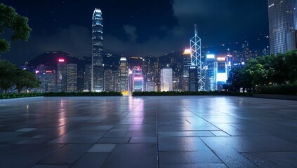 Nighttime cityscape featuring illuminated skyscrapers and a serene park