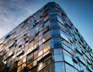 a close up shot of a building covered in multiple mirrors potentially used as a decorative or architectural feature