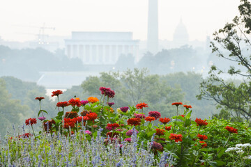 Washinton DC skyline with major monuments including Lincoln Memorial and Washington monument and the capitol in an foggy morning