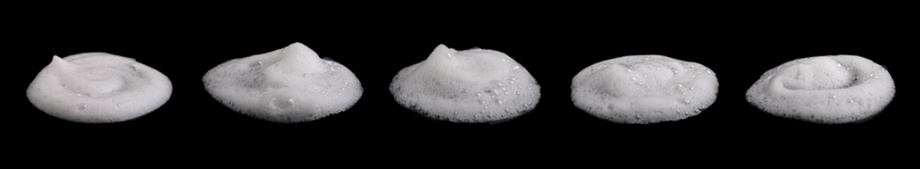 Shaving foam set, shampoo or shower gel, black background, textured and contrasting background.