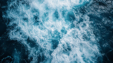 Fototapeta premium Beautiful aerial view of ocean waves with white foam in the turquoise sea, flat lay