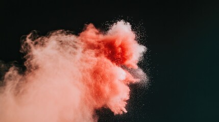 Vibrant explosion of red smoke creates dynamic contrast against