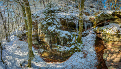 Dahner Felsenland after rainy days frost comes and with it many icicles that grow on the various rocks, fascinating shapes and structures