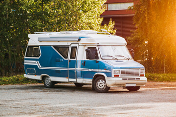 Motorhome parked in a serene wooded environment