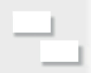 White business cards with soft shadows, mockup template, blank name cards on light background, 3d realistic design.