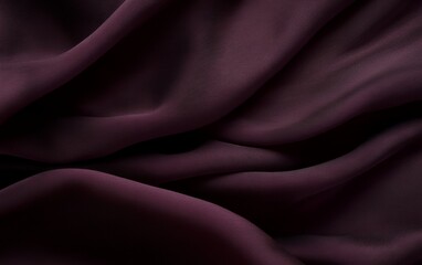 Obraz premium Elegant dark burgundy silk fabric with luxurious draped waves and smooth satin texture in a stylish abstract background for fashion and interior decor inspirations