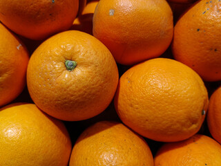 Pile Of Fresh Citrus Fruits Displaying Vibrant Colors And Textures