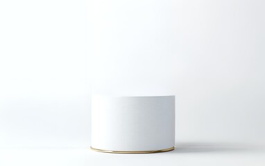 Simple white cylindrical display pedestal with gold base and minimalist aesthetic for product showcase and luxury branding in a sleek modern interior with a sophisticated design approach