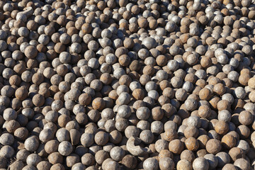 rusty steel balls on a pile