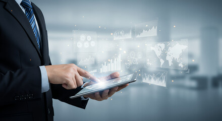 ** Data-Driven Success: Businessman Analyzes Charts & Global Map on Tablet for Strategic Growth & Insights