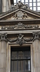 Obraz premium Ornate building facade with detailed carvings and window
