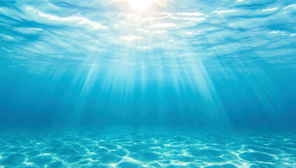 Fototapeta premium Blue ocean surface illuminated by sunlight with visible underwater texture