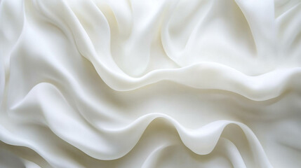 Fototapeta premium Soft white fabric draping elegantly in gentle waves, creating a serene and calming atmosphere of simplicity and beauty