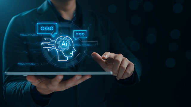 AI technology in daily life and business, young man uses tablet to use AI in work Access to big data networks, new era innovation artificial intelligence technology Deep learning.