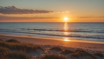 Obraz premium Scenic Beach Sunset Over Calm Waves and Sandy Shoreline with Space for Text and Summer Vibes