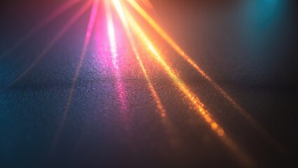 Abstract blur glow overlay with colorful gradients and lens flare on a smooth dark background, creating an optical radiance effect.