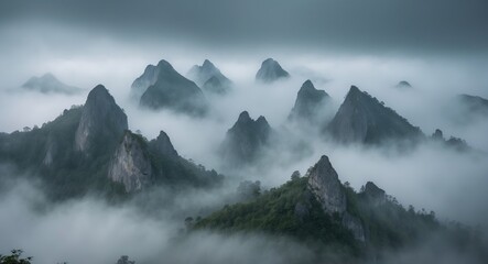 Majestic Mountain Peaks Emerged From Thick Fog With Tranquil Atmosphere And Space For Text In Scenic Landscape Environment