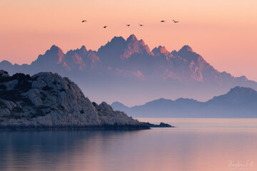 Sunrise over French Riviera mountains, calm sea backdrop