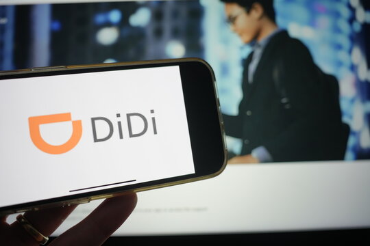 Roosendaal, The Netherlands - February 15, 2025: A mobile phone displaying the logo of Didi Global, with the company website in the background.