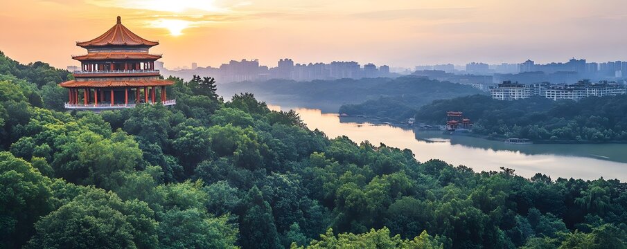 A tranquil view of Wuhan's Moshan Hill, with ancient pavilions nestled among dense forests and overlooking East Lake