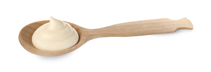 Tasty mayonnaise sauce in wooden spoon isolated on white