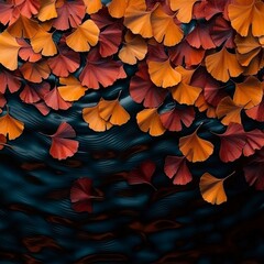 Autumn leaves ginkgo vibrant background. A serene close-up of vibrant autumn leaves floating on dark water, creating a harmonious blend of colors and nature's beauty.