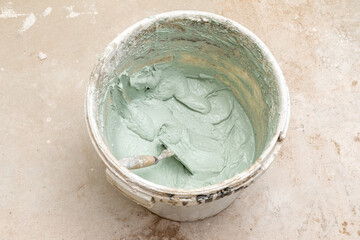 Construction Worker Plastering Wall – Renovation and Drywall Repair