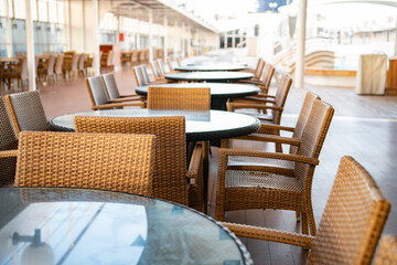 Tables and chairs in a cafe on the terrace 