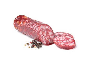 Delicious dry cured sausage and spices isolated on white