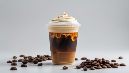 Refreshing Cold Coffee in Clear Plastic Cup with Whipped Cream and Coffee Beans on White Background for Beverage Promotion or Advertising