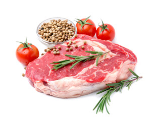 Piece of raw beef meat, tomatoes and spices isolated on white