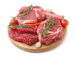 Pieces of raw beef meat, spices and tomatoes isolated on white