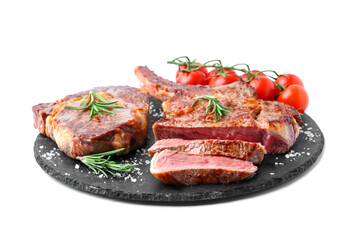 Pieces of delicious beef meat, spices and tomatoes isolated on white
