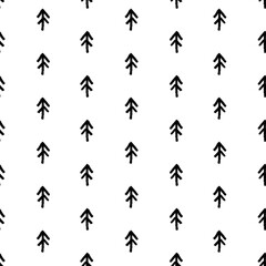 Black and white rhythmic seamless pattern of fir tree doodles hand drawn with marker