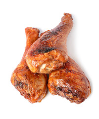 Delicious baked turkey drumsticks isolated on white, top view