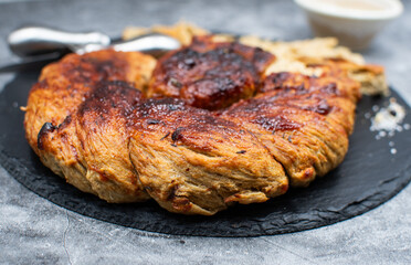 Roasted seitan as plant based meat on slate stone