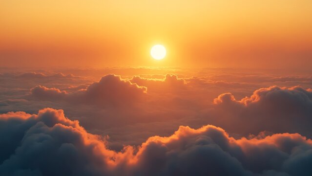 Radiant golden sun casting its warm glow over a vast sea of clouds. The soft, billowing clouds contrast beautifully with the sun&rsquo;s brilliant hue