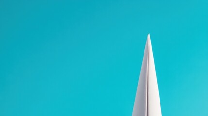 paper airplane on blue background