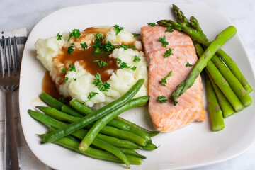 baked salmon with green beans, asparagus  and mash potatoes