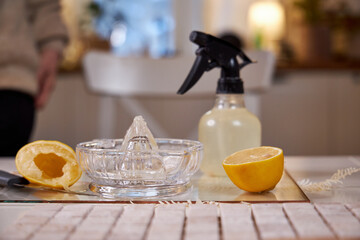 Natural homemade cleaning products with sponge and wash cloth in glass bowl