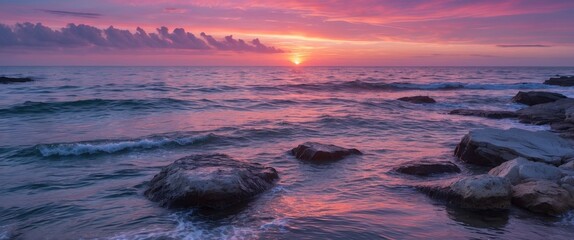 Naklejka premium Serene Ocean Sunset with Pink and Lilac Hues Over Calm Waters and Rocks, Ideal for Nature-Themed Designs and Text Space