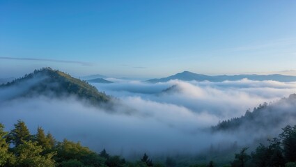 Mountain landscape with mist and clouds during sunrise in a natural environment Copy Space