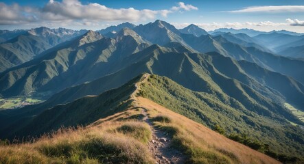 Fototapeta premium Mountain landscape with winding trail leading through lush green hills and peaks under a blue sky with clouds near sunset Copy Space