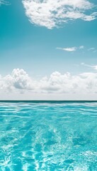 Fototapeta premium Stunning swimming pool scene with vivid blue water and fluffy white clouds in the sky