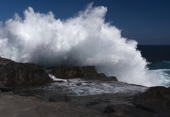 Gran Canaria, salt evaporation ponds Salinas el Bufadero around a blowhole Bufadero in the coast of Arucas municipality
