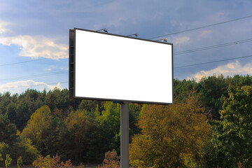 Background for design, white billboards on city streets and along roads in the summer day