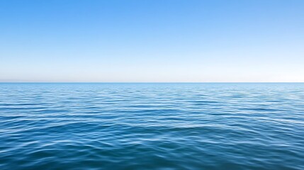 Obraz premium Serene Ocean Meets Tranquil Blue Sky