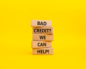Bad credit We can Help symbol. Wooden blocks with words Bad credit We can Help. Beautiful yellow background. Business and Bad credit We can Help concept. Copy space.